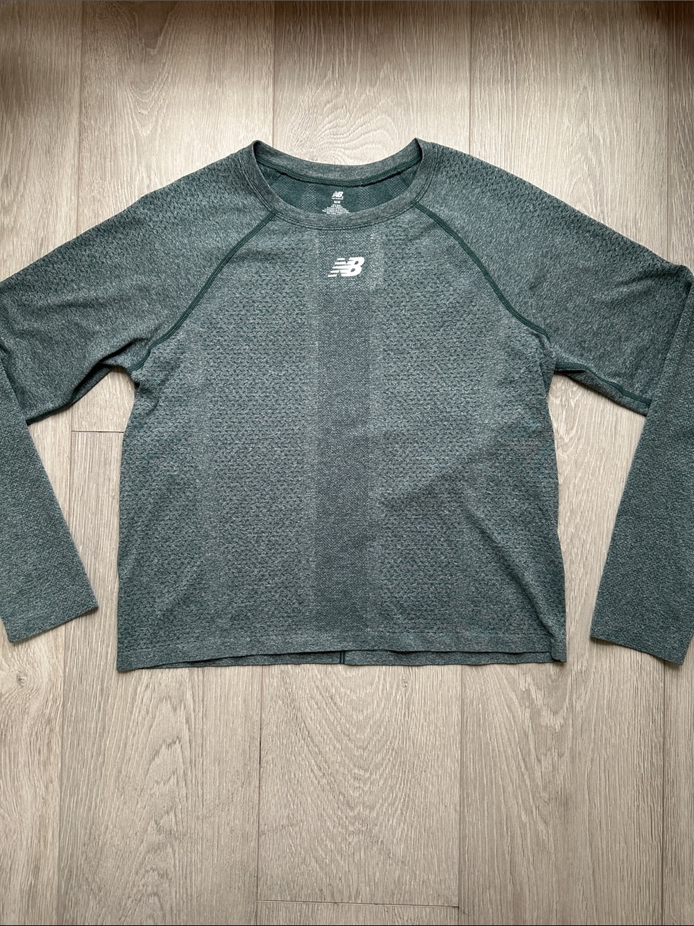 New Balance Women's Long Sleeve Heathered Dark Green Tee